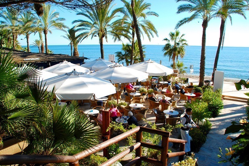 Cappucino grand cafe in Marbella with sea view by Costas & Casas