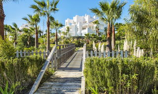 Moderne Mediterrane appartementen te koop met een eigen privé lagune aan de Costa del Sol 20065 