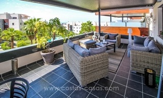 Quasi nieuw en modern appartement te koop op 5* golfresort in Benahavis, tussen Marbella en Estepona 1