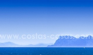 Estepona te koop: Beachfont luxe appartementen, Estepona, Costa del Sol 11