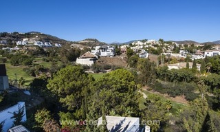 Moderne villa te koop met prachtig zeezicht op een golfresort in een chique wijk van Nueva Andalucía, Marbella 26