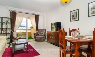 Centraal gelegen appartement te koop met zeezicht in Puerto Banus, Marbella 9