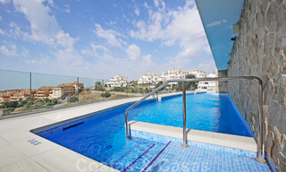 Moderne design appartementen met eigen zwembad te koop in boutique complex in Nueva Andalucia te Marbella 28746 