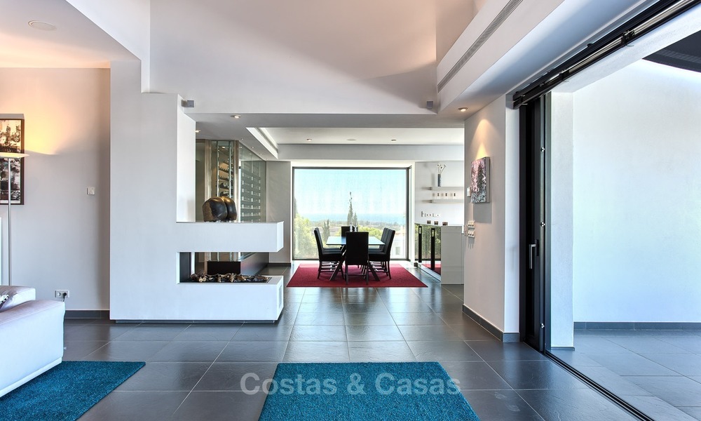 Exclusieve Moderne villa te koop met zeezicht in een golfresort in Marbella - Benahavis 1017