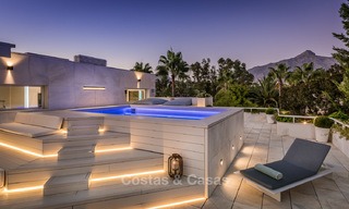 Eerstelijn golf ruim gemoderniseerd luxe penthouse te koop in Nueva Andalucia - Marbella 4028 