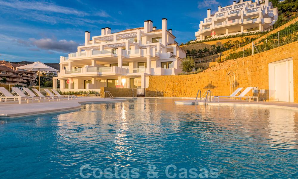 Luxe appartementen te koop in een exclusief complex in Nueva Andalucia - Marbella met panoramisch uitzicht over de golf en zee 31957