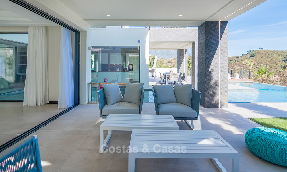 Weelderige nieuwbouw designer villa te koop in een exclusieve urbanisatie, Benahavis - Marbella 6900
