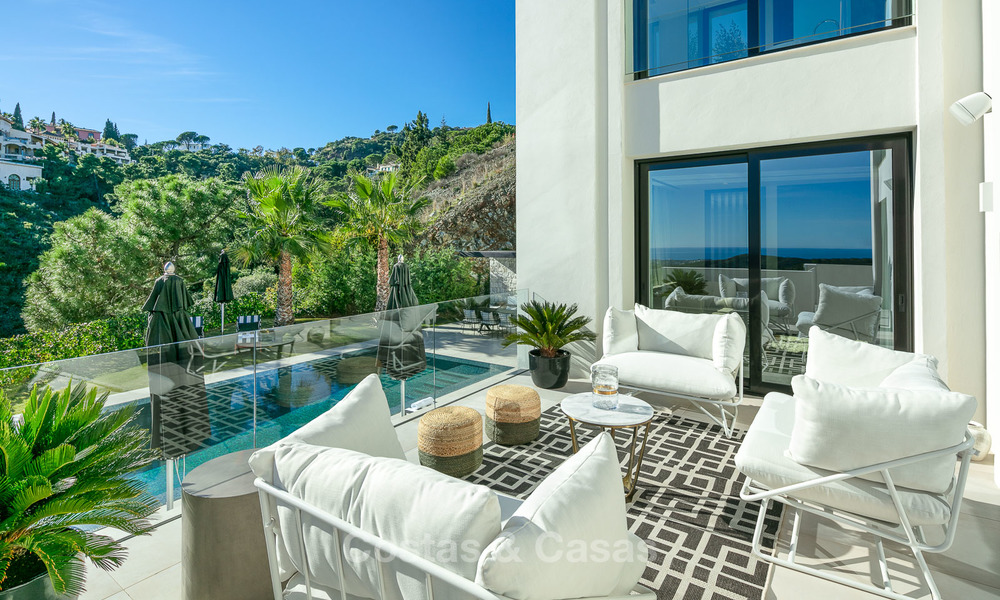 Oogstrelende, volledig gerenoveerde luxe villa met adembenemend zeezicht te koop in El Madroñal, Benahavis - Marbella 10088