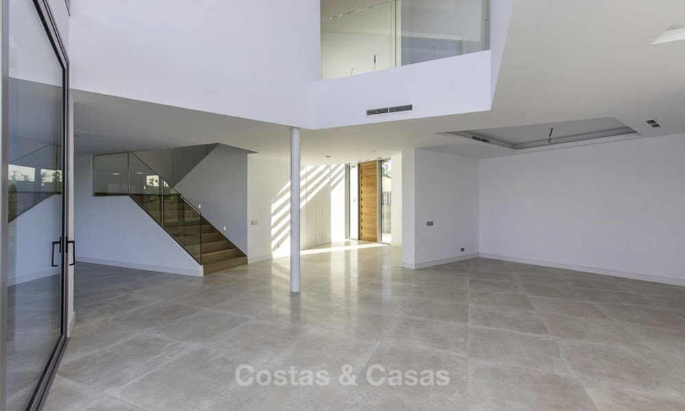 Oogstrelende moderne designer villa met zeezicht te koop, eerstelijn golf en instapklaar, Oost- Marbella 11827