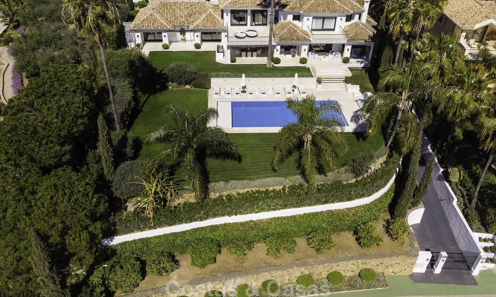 Indrukwekkende luxe villa met panoramisch zeezicht te koop in het hart van de Golf Vallei te Nueva Andalucia, Marbella 12084