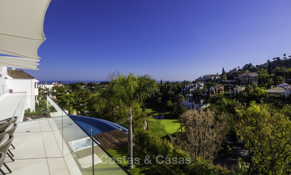 Gloednieuwe moderne luxe villa met golf en zeezicht te koop, instapklaar, in een golf resort in Nueva Andalucia, Marbella - Benahavis 13257