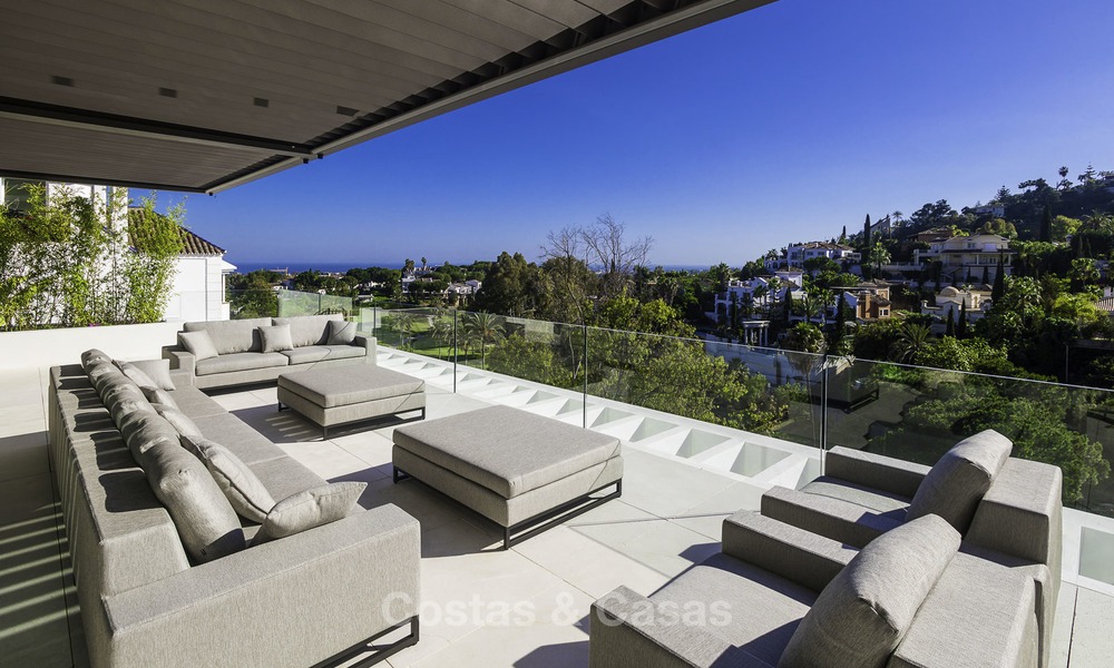 Gloednieuwe moderne luxe villa met golf en zeezicht te koop, instapklaar, in een golf resort in Nueva Andalucia, Marbella - Benahavis 13262