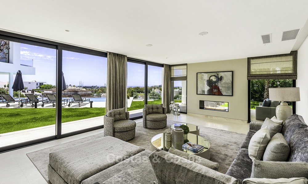 Instapklare nieuwe moderne villa met panoramisch golf- en zeezicht te koop in Benahavis - Marbella 13634