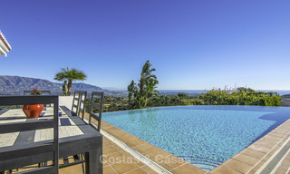 Prachtige modern-Andalusische villa met spectaculair panoramisch zeezicht te koop in Oost-Marbella 14786 