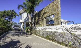 Prachtige modern-Andalusische villa met spectaculair panoramisch zeezicht te koop in Oost-Marbella 14819 