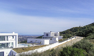 Oogstrelende nieuwe modern-hedendaagse luxe villa met zeezicht te koop in een stijlvol golfcomplex in Mijas, Costa del Sol 16349 