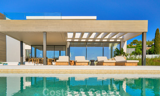 Spectaculaire eigentijdse luxe villa te koop, met prachtig zeezicht en een eerstelijns frontlinie golf positie in Benahavis - Marbella 36660 