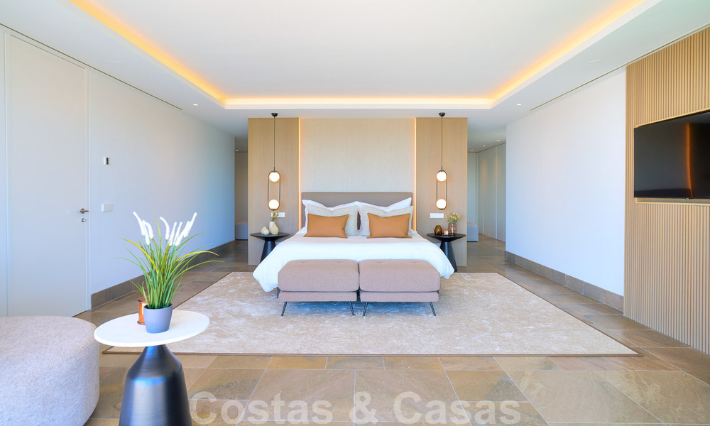 Spectaculaire eigentijdse luxe villa te koop, met prachtig zeezicht en een eerstelijns frontlinie golf positie in Benahavis - Marbella 36668