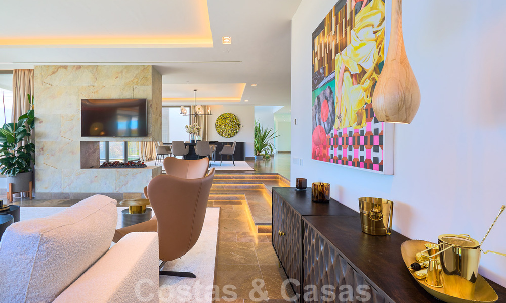 Spectaculaire eigentijdse luxe villa te koop, met prachtig zeezicht en een eerstelijns frontlinie golf positie in Benahavis - Marbella 36685