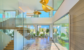 Spectaculaire eigentijdse luxe villa te koop, met prachtig zeezicht en een eerstelijns frontlinie golf positie in Benahavis - Marbella 36691 