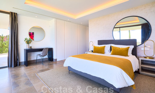 Spectaculaire eigentijdse luxe villa te koop, met prachtig zeezicht en een eerstelijns frontlinie golf positie in Benahavis - Marbella 36695 
