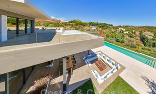 Spectaculaire eigentijdse luxe villa te koop, met prachtig zeezicht en een eerstelijns frontlinie golf positie in Benahavis - Marbella 36703 