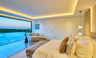 Spectaculaire eigentijdse luxe villa te koop, met prachtig zeezicht en een eerstelijns frontlinie golf positie in Benahavis - Marbella 36715 