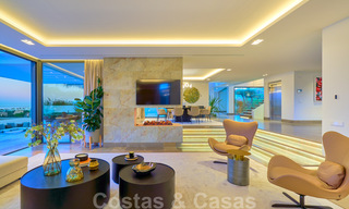 Spectaculaire eigentijdse luxe villa te koop, met prachtig zeezicht en een eerstelijns frontlinie golf positie in Benahavis - Marbella 36717 