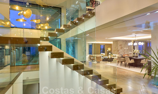 Spectaculaire eigentijdse luxe villa te koop, met prachtig zeezicht en een eerstelijns frontlinie golf positie in Benahavis - Marbella 36722 