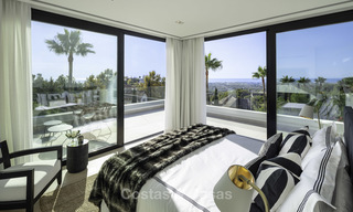 Fonkelnieuwe, instapklare moderne luxe villa met heerlijk zeezicht te koop in een gegeerde golfclub, Benahavis - Marbella 19545 