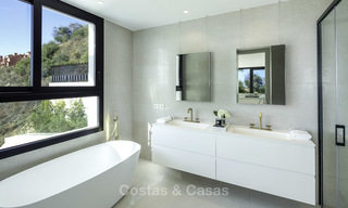 Fonkelnieuwe, instapklare moderne luxe villa met heerlijk zeezicht te koop in een gegeerde golfclub, Benahavis - Marbella 19547 