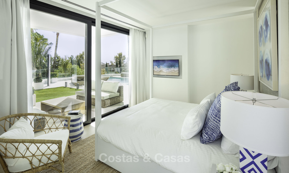 Fonkelnieuwe, instapklare moderne luxe villa met heerlijk zeezicht te koop in een gegeerde golfclub, Benahavis - Marbella 19554