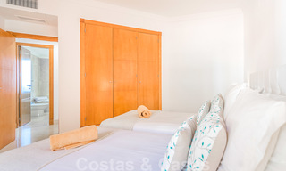 Mooi appartement met groot terras en prachtig uitzicht op zee te koop in een luxe complex met veel voorzieningen in Nueva Andalucia, Marbella 20130 
