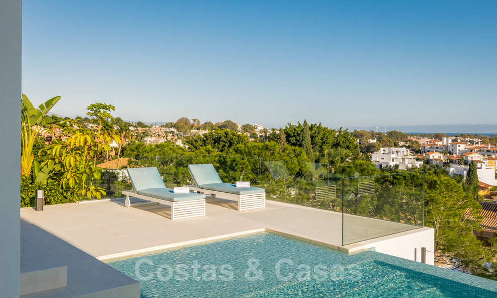 VERKOCHT. Super luxueuze eigentijdse villa met uitzicht op zee en bergen te koop in de Gouden Driehoek van Benahavis, Estepona, Marbella 29792