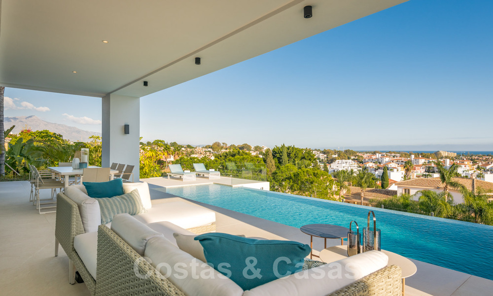 VERKOCHT. Super luxueuze eigentijdse villa met uitzicht op zee en bergen te koop in de Gouden Driehoek van Benahavis, Estepona, Marbella 29805