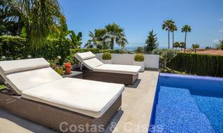 Moderne luxe villa met panoramisch zeezicht te koop in het prestigieuze Golden Mile district van Marbella 21011 