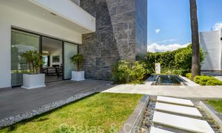Moderne luxe villa met panoramisch zeezicht te koop in het prestigieuze Golden Mile district van Marbella 21013 