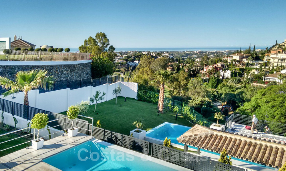 Te koop: instapklare nieuwe moderne villa met panoramisch uitzicht in een gegeerde urbanisatie in Benahavis - Marbella 21304