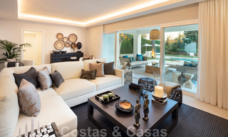 Majestueuze, volledig gerenoveerde Spaanse trendy villa te koop, direct aan de golfbaan in Nueva Andalucia, Marbella 21362 