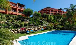 Luxe Appartementen te koop in Royal Flamingos met schitterend uitzicht over de golf en de zee in Marbella - Benahavis 23586 