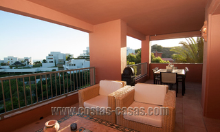 Luxe Appartementen te koop in Royal Flamingos met schitterend uitzicht over de golf en de zee in Marbella - Benahavis 23587 
