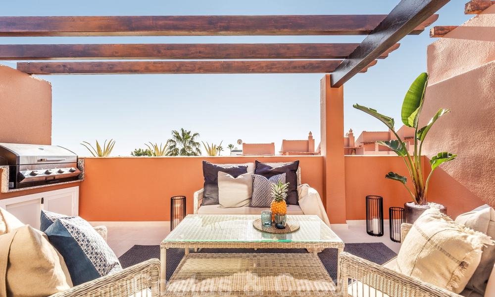 Elegant gerenoveerde schakelwoning te koop in Aloha, Nueva Andalucia, Marbella 23794