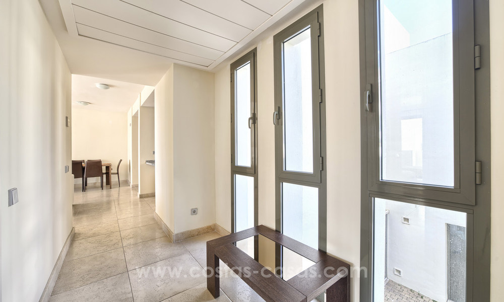 TEE 5 : Ruime moderne luxe eerstelijnsgolf appartementen met een prachtig golf- en zeezicht te koop in Marbella - Benahavis 24544