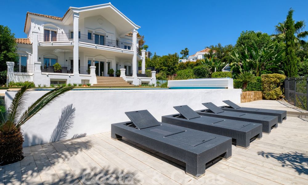Instapklare villa in klassieke stijl te koop in het gegeerde Nueva Andalucia, Marbella 25096