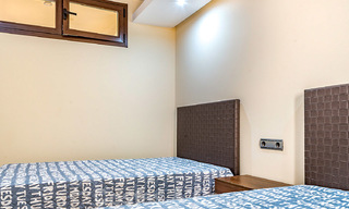 Modern tuinappartement te koop in een eerstelijns strand complex met eigen zwembad tussen Marbella en Estepona 25656 