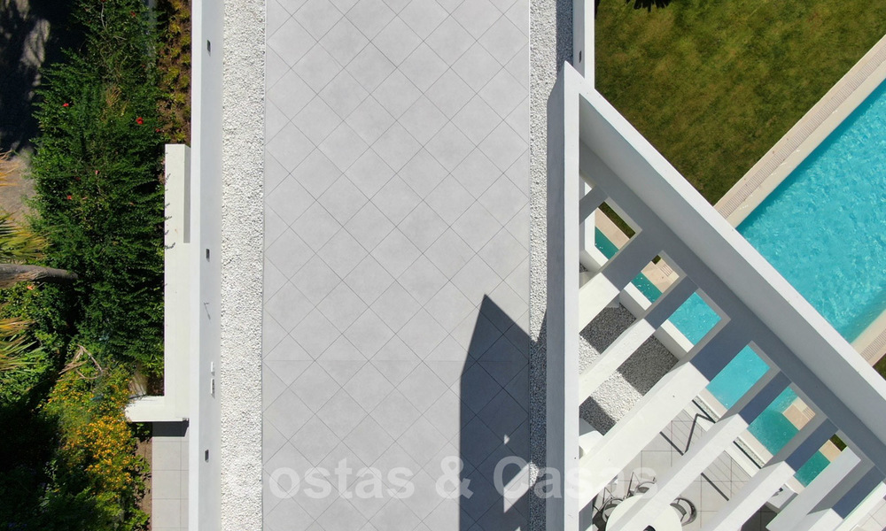 Moderne villa met zeezicht te koop in Los Flamingos Golf in Marbella - Benahavis. Verlaagd in prijs. 26003