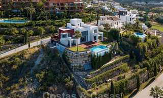 Moderne villa met panoramisch golf- en zeezicht te koop in Los Flamingos Golf in Marbella - Benahavis 26014 