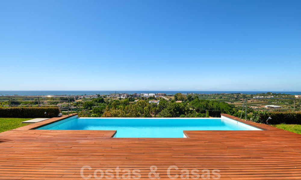 Moderne villa met panoramisch golf- en zeezicht te koop in Los Flamingos Golf in Marbella - Benahavis 26062