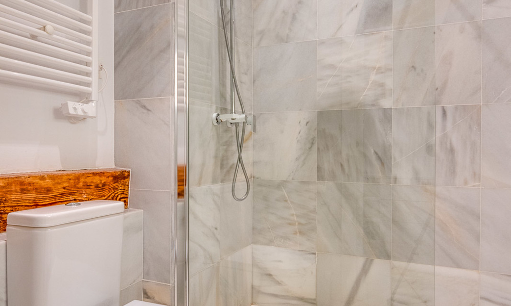 Uitzonderlijke aanbieding: prachtig eigentijds gerenoveerd appartement te koop in het historische centrum van Malaga 26251