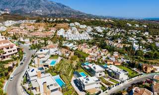 Laatste villa! Hedendaagse moderne nieuwbouw villa met zeezicht te koopin Nueva Andalucia, Marbella 30317 